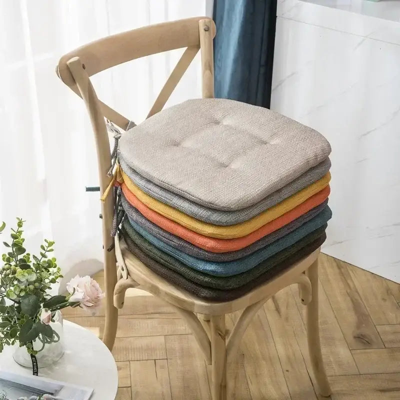 Tufted beige textured dining chair cushions for dining room